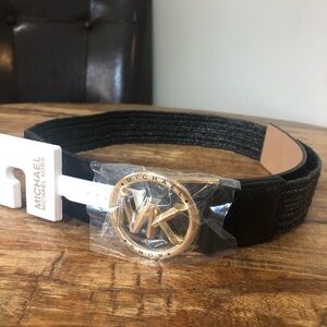 Michale Kors gold toned MK stretch belt, women size medium, brand new with tag